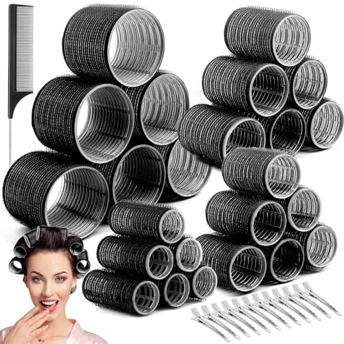 Set of black hair rollers in four different sizes with stainless steel clips