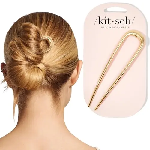 Gold-toned metal French twist hair pin on a plain background