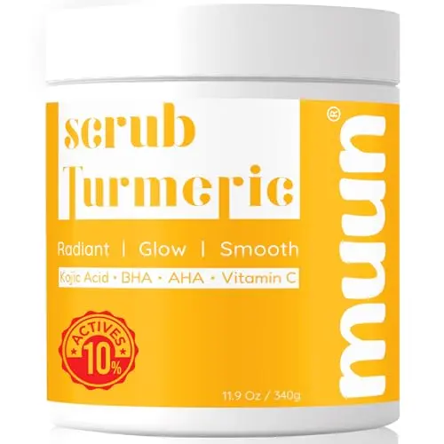 Muun Turmeric Scrub with Kojic Acid in a jar, showing a vibrant turmeric color